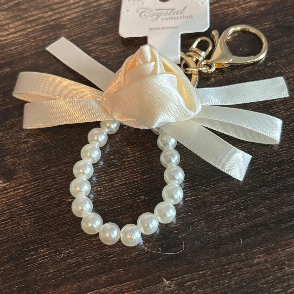 Crystal Collection Ivory Satin Rose Faux Pearl Bow Keychain Gold Tone Clasp